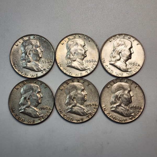 Six Assorted Years United States 90% Silver Franklin Half Dollars - FV: $3.00