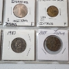 Image 7 : Binder Page Filled with Assorted World Coins: Costa Rica, Ecuador, Guatemala, Malaysia, & More! 
