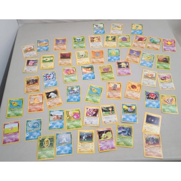 Large Assortment Of Pokémon Trading Cards Including Some Vintage
