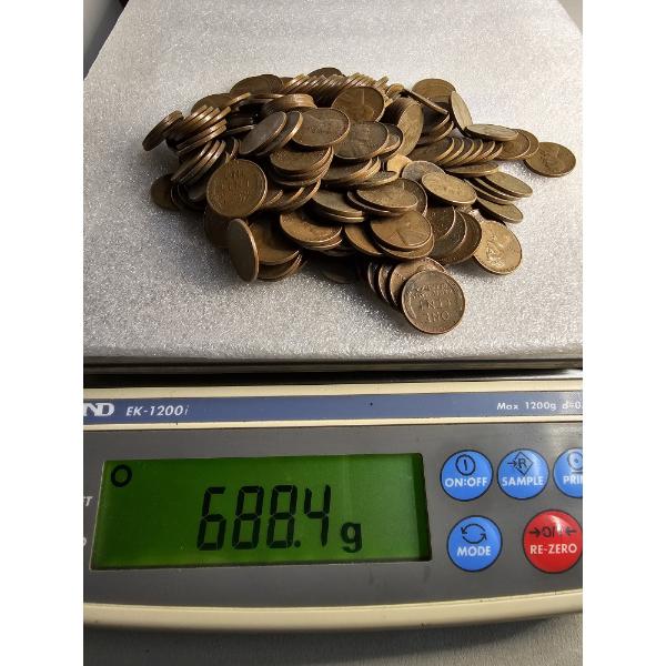 Lot of Assorted Wheat Pennies (688g) - AFV: $2.21 (estimated by weight)