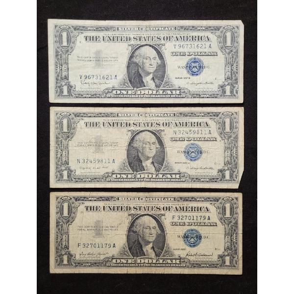 Three 1957 United States Silver Certificates 
