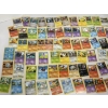 Image 5 : Tin of Tons of Pokémon Cards - Servine - Emolga - Pikachu- Sandile - Etc.