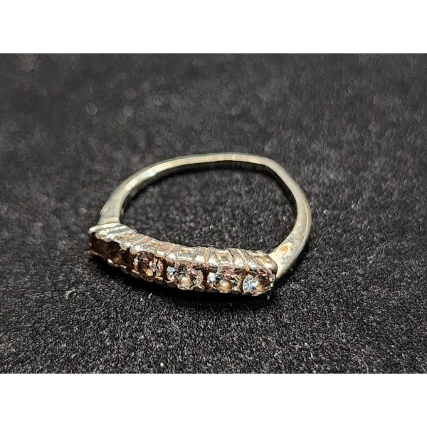 10K Gold Ring Ft. Clear Stones Weighing 2.3 Grams