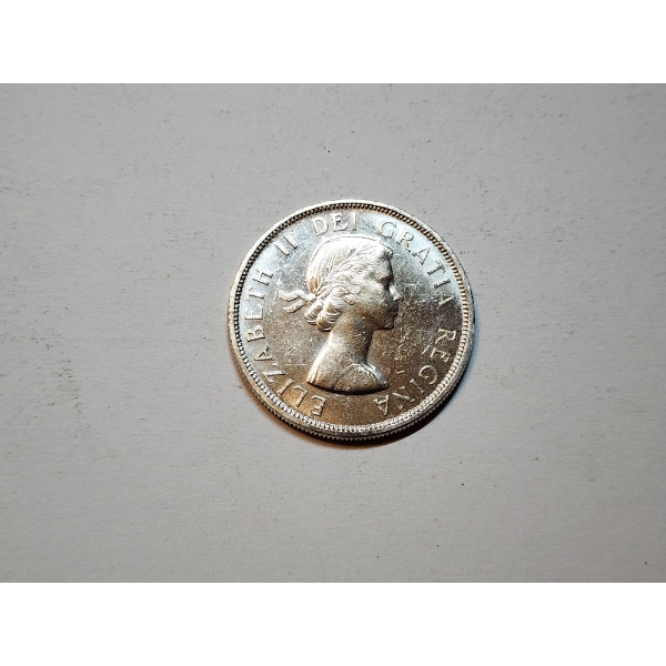 1959 Canadian Silver Dollar ASW: 0.6 oz