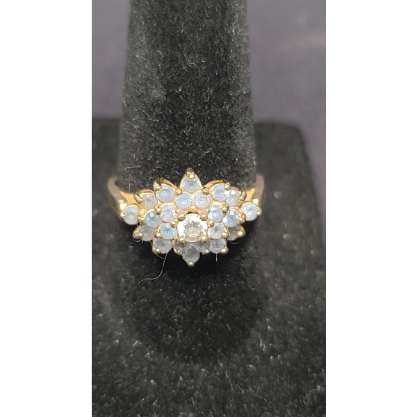14K Gold Ring Weighing 4.0 Grams Ft. Many Small Blue Stones & One Clear