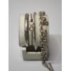 Image 1 : Lot of 4 Sterling Silver Bracelets: Bangles and Chain - Total Weight: 49.5g