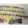 Image 4 : Tin of Tons of Pokémon Cards - Servine - Emolga - Pikachu- Sandile - Etc.