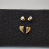 Image 1 : Two Pairs of 14K Gold Earrings: Clear Stone Stud & Heart-Shaped - Total Weight: 1.3g
