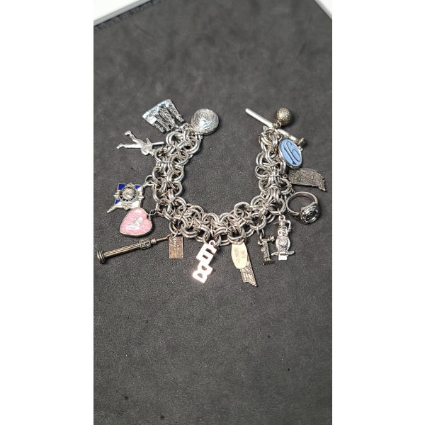 Charm Bracelet With Many Sterling Silver Charms