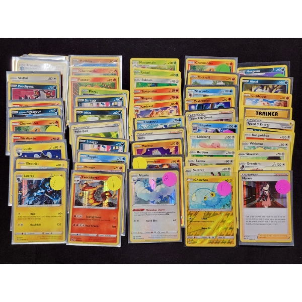 Over 50 Assorted Pokemon Trading Cards Including Holos, Reverse Holos, Rares & More!