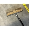 Image 2 : SeeMore putter - features a patented system with a red dot on the putter head and a black shaft