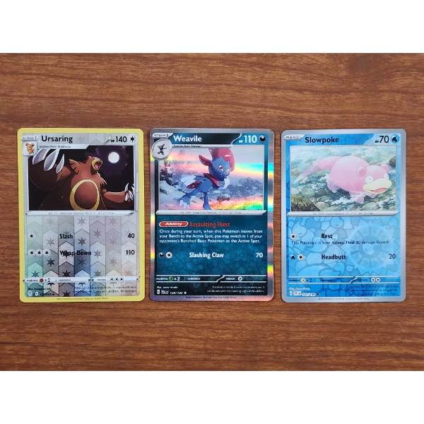 Three Assorted Pokemon Trading Cards Ft. Reverse Holo & Holo!