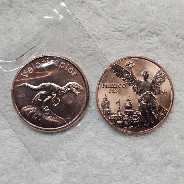 Two Assorted One Ounce .999 Fine Copper Art Rounds ft. Velociraptor and Libertad Homage