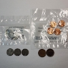 Image 6 : Assorted U.S. Coins: 3 Reprocessed Steel Cents, 2009 UNC Cents, 3 Loose Steel Cents, 2 Loose Nickels