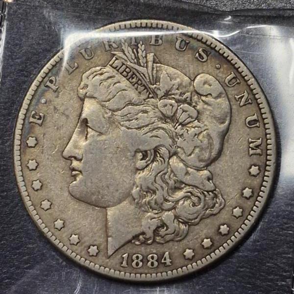 1884 P Morgan 90% Silver Dollar - Circulated Mid Grade