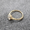Image 2 : 14K Yellow Gold Ring Ft. Clear Center Stone ~ Size 6 ~ Weighs 1.5 Grams Total