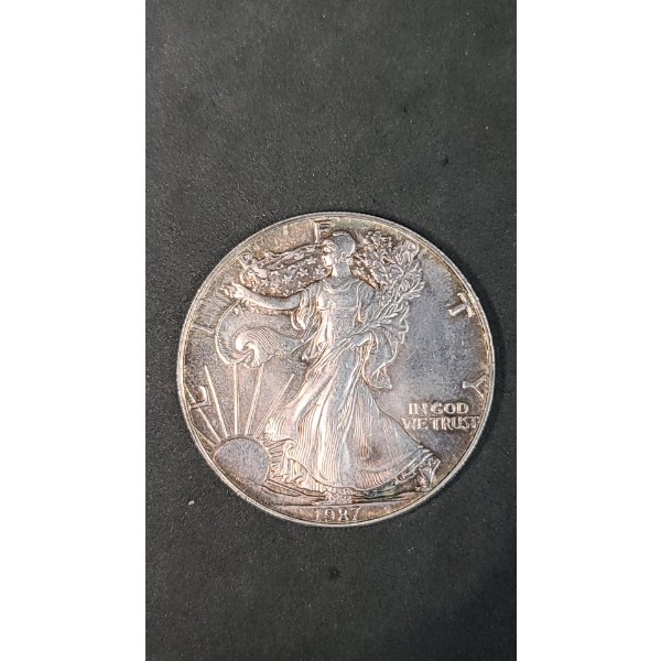 1987 1 Oz .999 Fine Silver American Eagle - Toned
