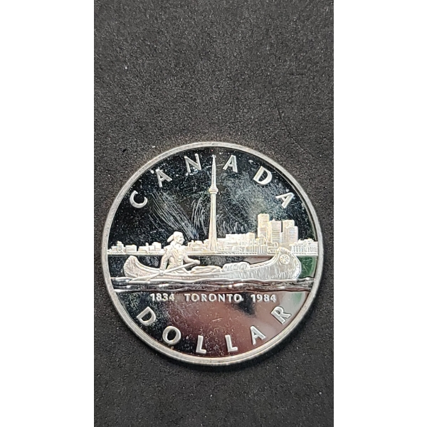 1984 Canadian 150th Anniversary (Sesquicentennial) Of Toronto 50% Silver Dollar - ASW: 0.375oz