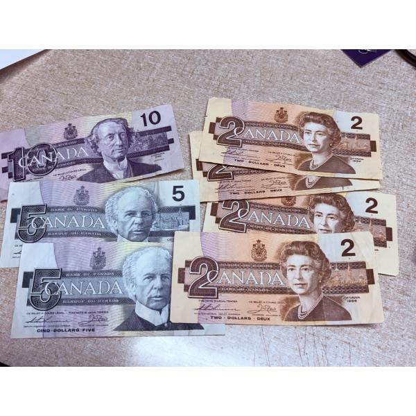 Assorted Foreign Paper Money - $2 (4) $5 (2) & $10 (1) 