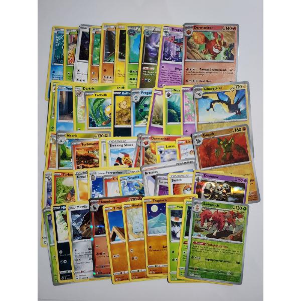 50 Assorted Pokemon Trading Cards Featuring Holo, Reverse Holo's & Rares!