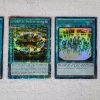 Image 2 : Three Assorted Holo Magic Yu-Gi-Oh Trading Cards!