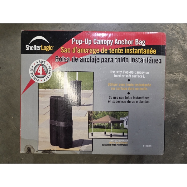 New In Box-Shelter Logic Pop Up Canopy Anchor Bag Set