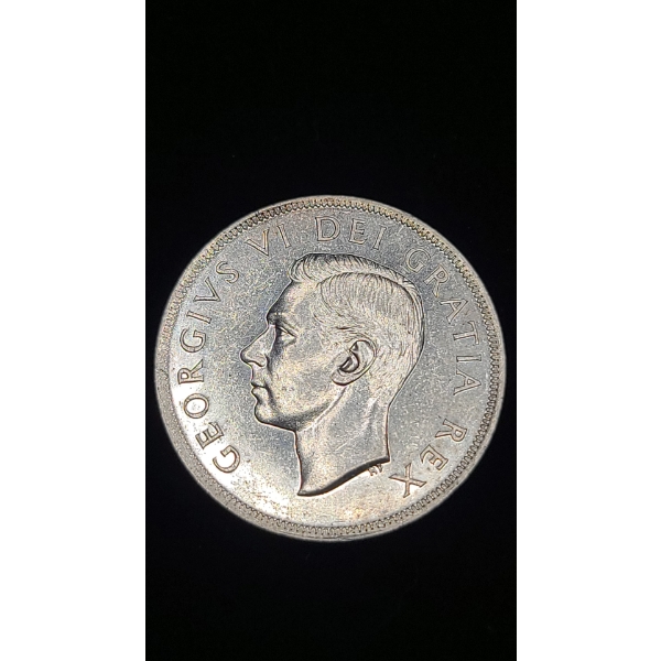 1949 Canadian 0.8000 Silver Dollar - ASW: 0.6oz