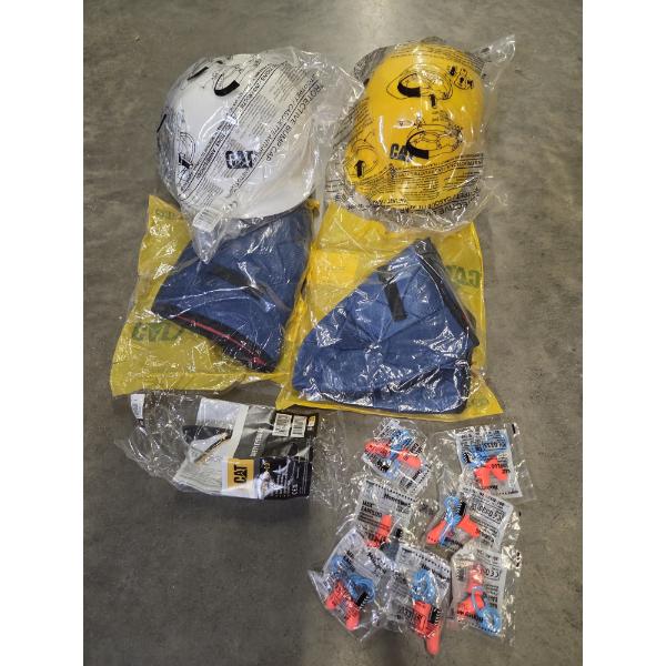Two New CAT Bump Helmets, 2 Liners, 1 Pair Eye Protection, And 7 Ear Plug Sets