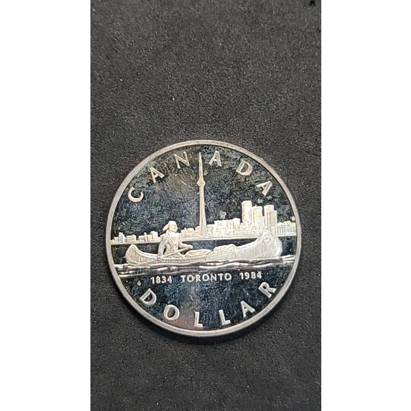 1984 Canadian 150th Anniversary (Sesquicentennial) Of Toronto 50% Silver Dollar - ASW: 0.375oz