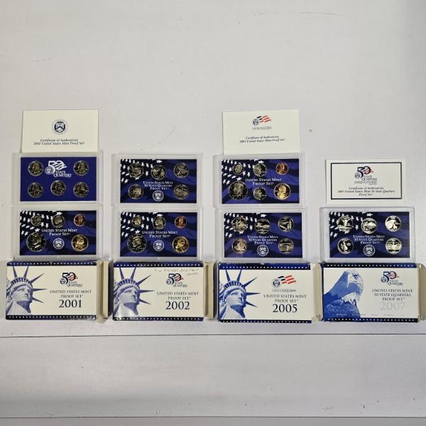Collection of United States Mint 50 State Quarters Proof Sets from 2001, 2002, 2005, and 2007
