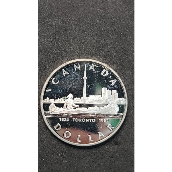 1984 Canadian 150th Anniversary (Sesquicentennial) Of Toronto 50% Silver Dollar - ASW: 0.375oz
