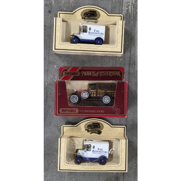 New In Box Vintage Toy Collection Including 2 Repository Trucks And Matchbox 1930 Ford Truck 