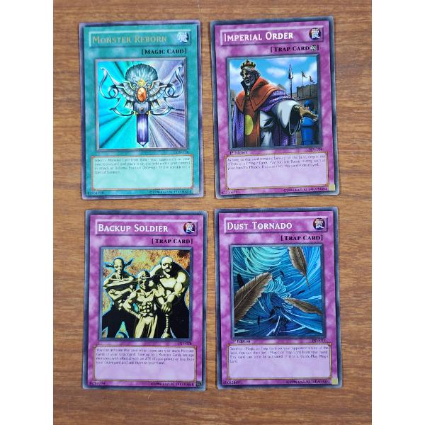 Four Assorted Vintage Holo Yu-Gi-Oh Trading Cards Including 1st Editions!
