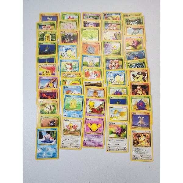 Over 50 Assorted Vintage Pokemon Trading Cards
