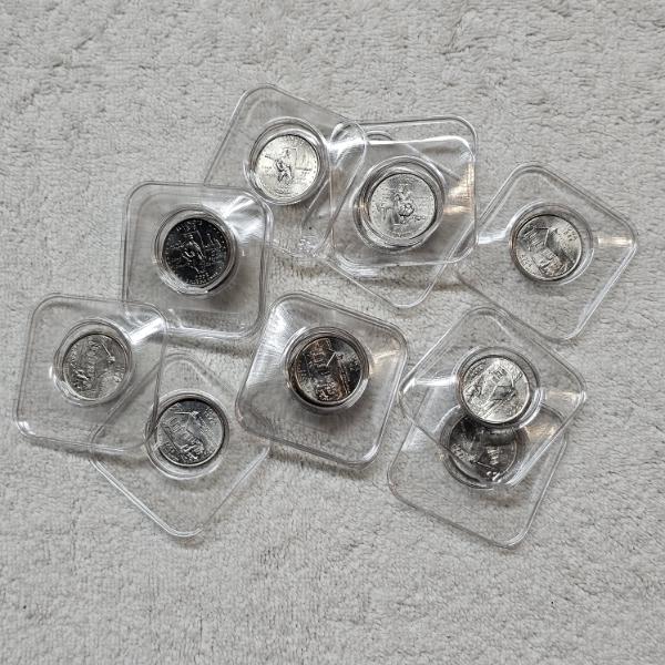 Collection of United States Statehood Quarters in Individual Plastic Casings FV: $9.25