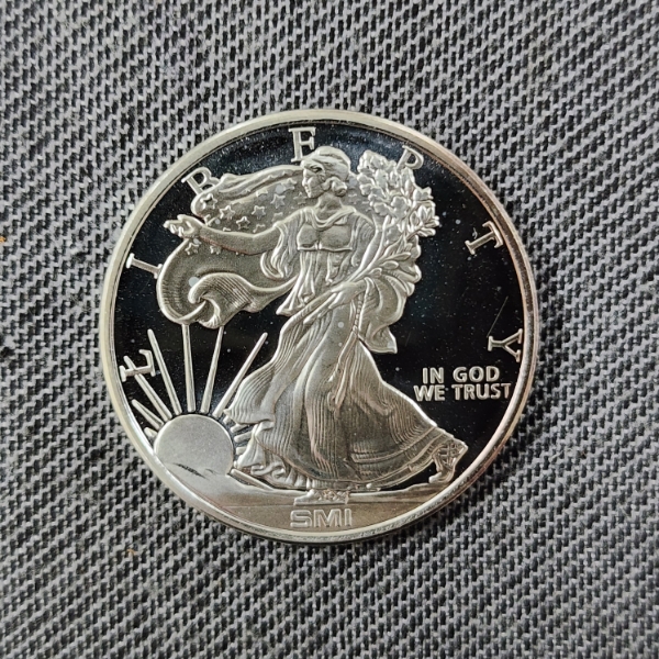 One Troy Ounce .999 Fine Silver Mint Mark SI Sunshine Mint Walking Liberty Eagle Design Round