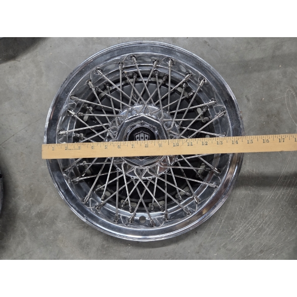 Two Sets Of 4- 14'' Wire Wheel Covers In Great Condition!