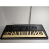 Image 1 : Yamaha PSR-320 61-Key MIDI Keyboard featuring a Black Chassis and a Multi-Function LCD Display