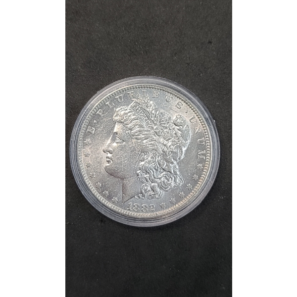 United States 1882-O Morgan 90% Silver Dollar In Coin Capsule