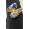 Image 2 : 10K Gold Blue Topaz & Diamond Hug Ring - Size 3 - Weight: 2.9g