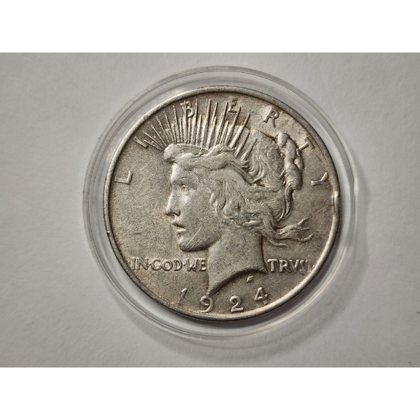 UNITED STATES 1924 SILVER PEACE DOLLAR WITH NICE RIM TONING ~ Minted at the Philadelphia Mint!