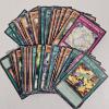 Image 1 : Yu-Gi-Oh! TCG: Mixed 50 Card Lot Featuring Draw Muscle, Lightsworn Barrier, Lyla, and Jain