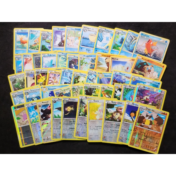 Large Lot of 50 Pokemon Trading Cards Including Holo's, Reverse Holo's & Rares!
