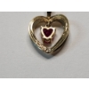 Image 3 : 10K Yellow Gold Heart Pendant with Ruby Colored Center Stone TW: 1.8g
