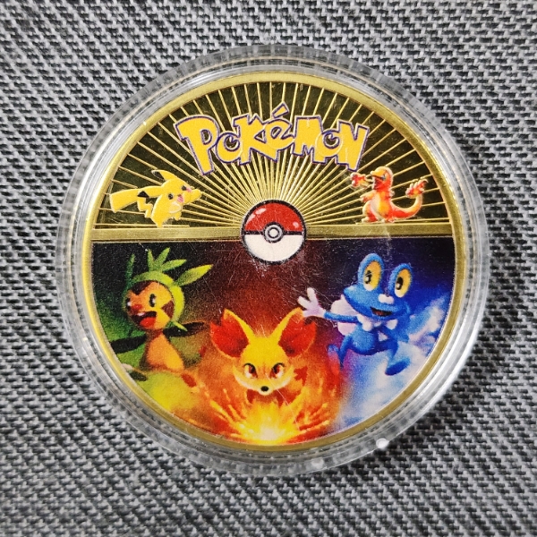 Commemorative Pokemon Coin Featuring Starters Chespin, Finnekin & Froakie
