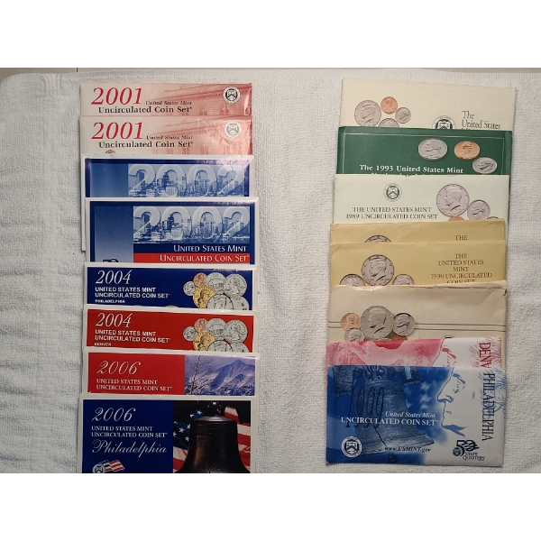 16 Sleeves of Assorted UC Coin Sets from Various Years