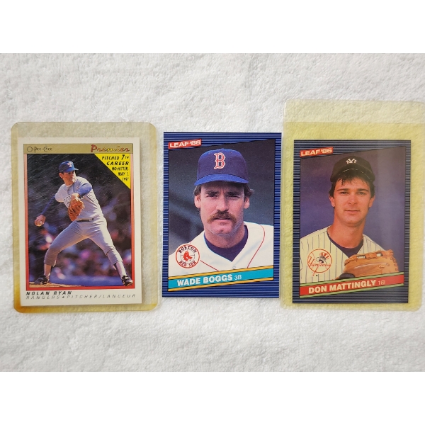 Three Assorted Baseball Trading Cards Featuring Stars Like Nolan Ryan, Wade Boggs & Don Mattingly