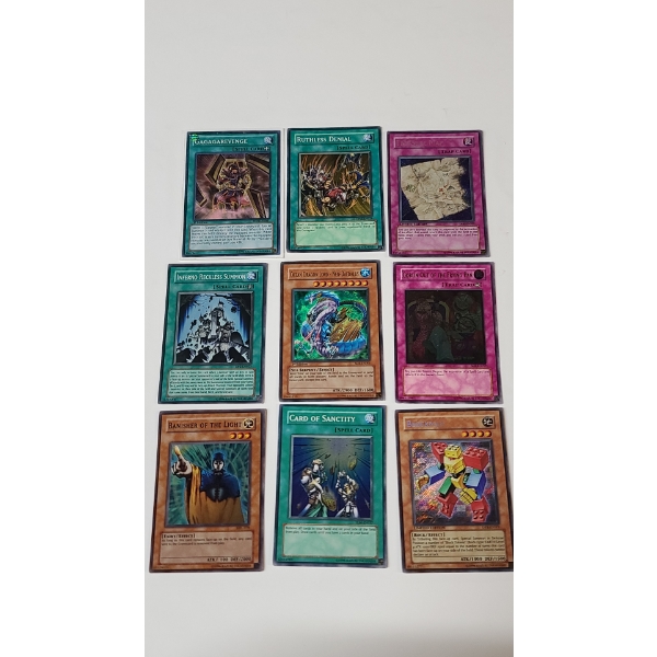 
Assorted Yu-Gi-Oh Cards Including Holos & 1st Edition Cards