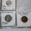 Image 12 : Two Binder Pages Filled with Assorted World Coins: Cuba, Argentina, Australia, India, & More!