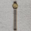 Image 3 : Bon Ton Bass Gold Tone Watch with Damaged Stainless Steel Band and Velvet Pouch